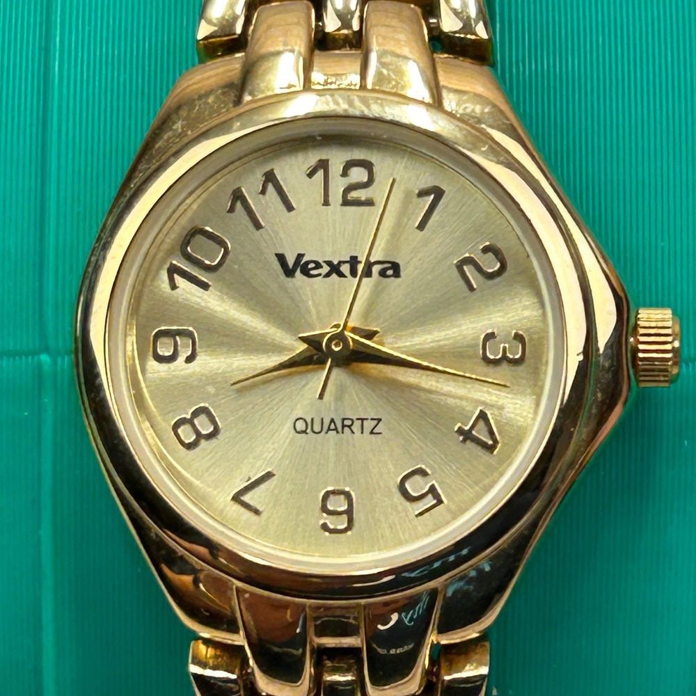 Vextra V-100 Womens Gold Tone Quartz Watch Jewelry Clasp Stainless Steel Back‎